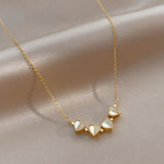 White Shell Heart Necklace – Elegant Gold Chain